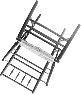 Dark woven chair viewed from below