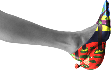 Right grayscale leg ending in a colorful patterned shoe
